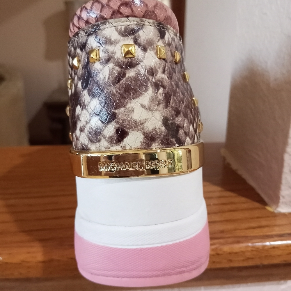 All new Michael Kors style sneakers worn one time.